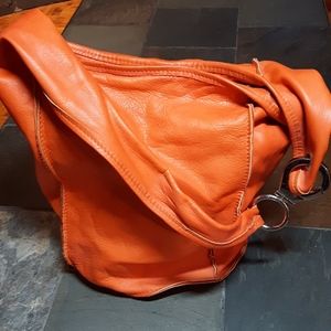 Orange leather Nardell bucket bag.